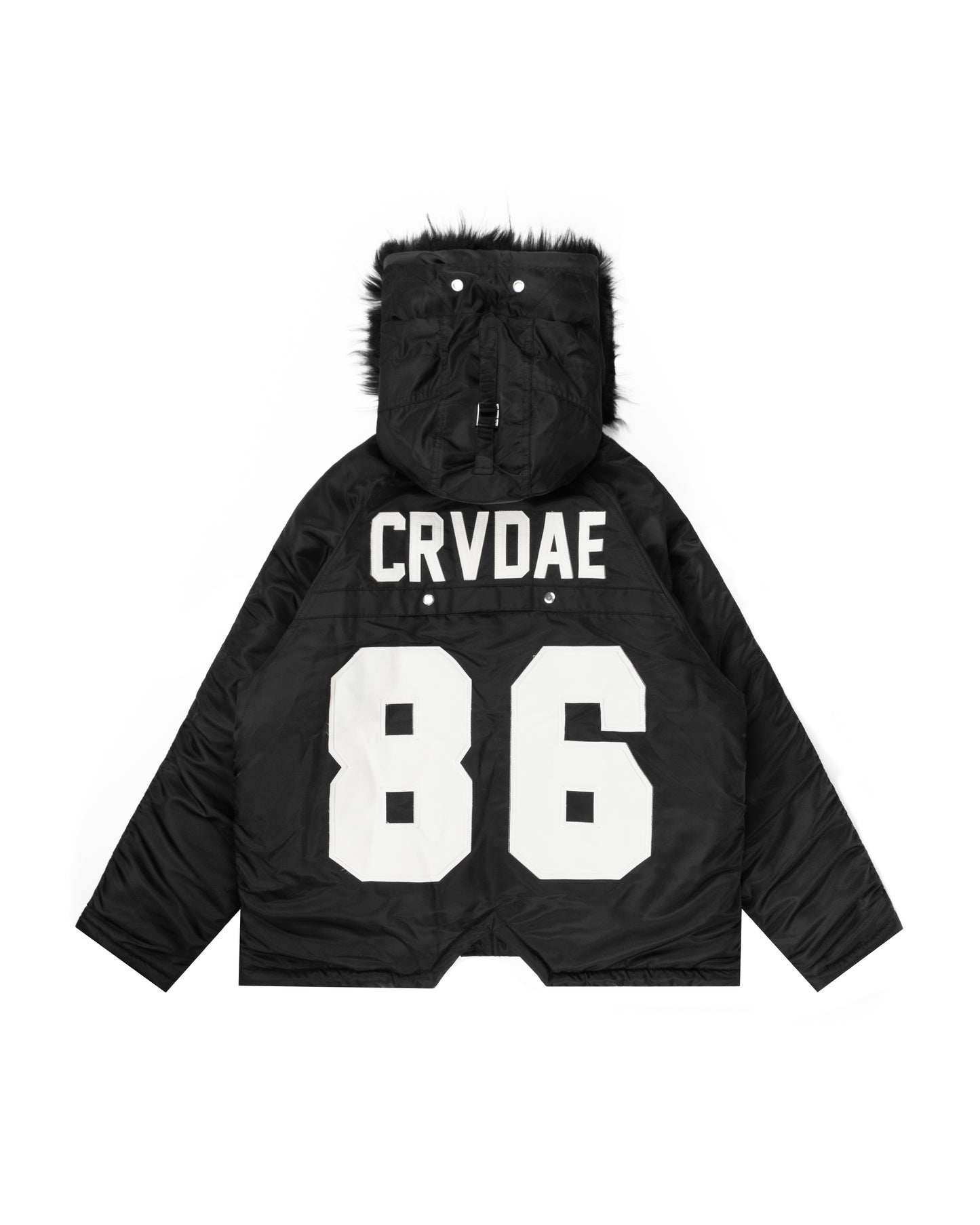 Back view of a black parka jacket featuring a faux fur-lined hood, bold white CRVDAE branding, and large 86 design, offering a modern winter style.